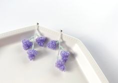 Handmade light purple (Indigo) / light green beaded grape earrings! 3 grapes on each earring.  There are only two pairs of these cuteeeeest earrings. The Spring and the summer are coming soon, these earrings will be perfectly fit for you.  Earrings length 2.3 inches. ♥️ Please feel free to contact me if you have any other questions! ♥️ Handmade Lavender Beaded Earrings For Gift, Lavender Beaded Drop Earrings, Lavender Drop Beaded Earrings, Purple Flower Shaped Beaded Earrings For Gifts, Purple Earrings With Tiny Beads For Gift, Lavender Earrings With Dangling Beads For Gifts, Hell Lila, Grape Earrings, Purple Jewelry