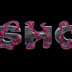 the word art spelled with pink glass letters