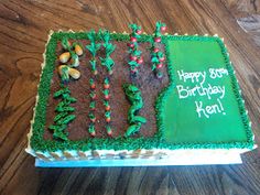 a birthday cake that looks like it has been made to look like a vegetable garden