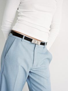 Add a luxurious statement to your everyday look with the Selene Belt. Made with 100% leather with a stone detail and a beautiful custom silver statement buckle. Item Details: Metal buckle detail Adjustment: 8 holes Strap Width: 20mm Genuine Leather Sizing: XS/S: 32'': Depending on where you like your belt to sit, fits jean size 24, 25, 26, 27. M/L: 37'': Depending on where you like your belt to sit, fits jean size 27, 28, 29, 30. Measurement is taken from the buckle point to the third hole. Gift Wrapping Available Each piece comes in its own luxury Love Isabelle Packaging with one gift box per order. Elegant Silver Belts For Business, Elegant Silver Belt Buckles For Business, Elegant Silver Leather Belt Buckles, Modern Silver Belt For Formal Occasion, Elegant Formal Belts With Silver Buckle, Elegant Formal Belt With Silver Buckle, Modern Formal Belt Buckles With Palladium Hardware, Modern Formal Belts With Silver Buckle, Modern Formal Belt With Silver Buckle