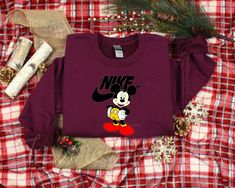 Nike Mickey Crewneck Swweatshirt Whether it’s a birthday surprise, a family vacation, or just because, our comfy, custom shirts are gifts made with love. Need a t-shirt or sweatshirt with your kiddo’s name and their favorite character: Mickey mose combine with Nike logo T-SHIRT Premium High Quality The shirts we print are Bella Canvas, Gildan [...] Disney Fan Merchandise Crew Neck Sweatshirt, Disney Crew Neck Sweatshirt Fan Merchandise, Disney Crew Neck Sweatshirt For Fans, Family Matching Mickey Mouse Crew Neck T-shirt, Disney Letter Print Sweatshirt For Fan Events, Themed Crew Neck Tops As Gift, Disney Crewneck Sweatshirt, Dark Chocolate Color, Disney Sweatshirts