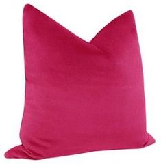 a bright pink pillow on a white background