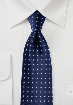 Make a striking style statement with the Navy and Bright White Polka Dot Necktie. This eye-catching accessory combines the timeless charm of navy with the fresh, crisp appeal of bright white. Adorned with classic polka dots, this necktie adds a touch of playfulness and sophistication to your ensemble. Whether you're shopping for mens suits or attending a special occasion, this necktie is a versatile choice that effortlessly complements a variety of looks. The navy and bright white color combinat Elegant White Ties For Work, Elegant White Ties For Workwear, Elegant Polka Dot Ties, White Pocket Square, Colorful Inspiration, Polka Dot Tie, Tie Pattern, Navy Tie, Polka Dot Fabric