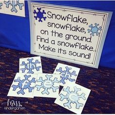 snowflakes are on the ground next to a sign that says, snowflake on the ground find a snowflake make it's sound