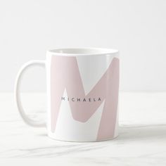 a coffee mug with the name michaela on it