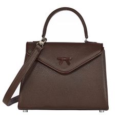 Handmade in New York, the Lynn bag is crafted in chocolate brown Italian pebbled leather. Features chocolate brown lambskin piping, signature bow detail, nickel hardware and a magnetic snap closure. Nickel Hardware, Credit Card Holder, Chocolate Brown, Pebbled Leather, Piping, Zipper Pocket, Shoulder Strap, New York, Leather