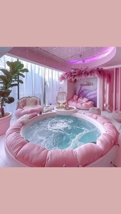 a pink room with a large hot tub in the center and lots of pillows on the floor