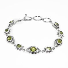 Beautifully handcrafted in solid sterling silver, this sterling silver bracelet features a natural Peridot gemstone. The perfect gift for our loved ones, it's both cute and practical! It is a perfect Christmas or Valentines gift. We Assure Your Satisfaction With Our High-Quality Jewelry * Sterling Silver * Natural Gemstone * Nickel free * Made in India With Love And High Standards ※ Please let us know if you have any questions or requests. Thank you for visiting our shop :) Silver Peridot Jewelry With Gemstone, Sterling Silver Bracelet With Gemstone, Elegant Sterling Silver Bracelets For May Birthstone, Sterling Silver White Gold Bracelets With Gemstone, Sterling Silver Gemstone Bangle, Silver Bracelets With May Birthstone, Fine Jewelry Sterling Silver Oval Bracelet, Oval Sterling Silver Bracelet In Fine Jewelry Style, Elegant Peridot Jewelry With Natural Stones