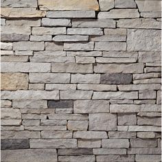 a stone wall is shown in grey tones