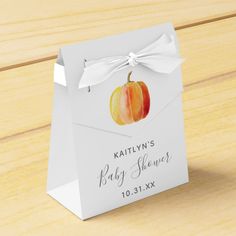 a baby shower bag with an apple on it