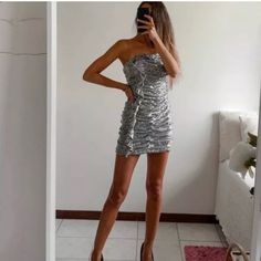 Hard To Find Silver Strapless Party Dress, Silver Strapless Summer Dress, Silver Strapless Dress For Summer, Metallic Mini Dress For Cocktail, Silver Chic Fitted Sequin Dress, Silver Strapless Sequin Dress For Party, Silver Strapless Sequin Dress For Party Season, Strapless Silver Sequin Party Dress, Silver Strapless Sequin Party Dress