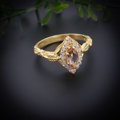 Indulge in the timeless elegance of our Elegant Marquise Cut Moissanite Ring, a true symbol of sophistication and luxury. Crafted with precision, this ring features a dazzling moissanite gemstone, cut into a graceful marquise shape to maximize its brilliance. Available in sizes ranging from 4-8 mm, and offered in three luxurious finishes - Silver, Gold, and Rose Gold - each imparting its own unique charm to this exquisite piece. Ideal for engagements, bridal bands, or as a cherished promise ring, this vintage-inspired marquise ring is designed to capture hearts and inspire admiration. The 1.5Ct moissanite centerpiece radiates with unmatched brilliance, creating a mesmerizing sparkle that will leave a lasting impression. Meticulously crafted by skilled artisans, each ring ensures impeccable Gold Topaz Jewelry With Halo Setting, Elegant Topaz Halo Ring, Rose Gold Topaz Jewelry For Wedding, Elegant Topaz Jewelry With Halo Design, Elegant Topaz Halo Jewelry, Rose Gold Topaz Jewelry With Accent Stones, Elegant Halo Topaz Jewelry, Rose Gold Topaz Jewelry For Anniversary, Marquise Ring