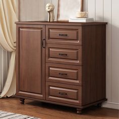 a wooden cabinet with five drawers and a mirror on top