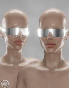 two mannequins with mirrored glasses on their faces, one is looking at the camera