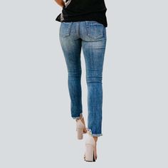 Introducing 2023 Spring-Summer Collection's distressed women's skinny jeans. with a grunge style that is sure to turn heads! Crafted from premium denim. these low-waist jeans feature a unique zippered and button closure. making them the perfect blend of fashion and function.Distinctive Features: Grunge Style: The distressed look gives these skinny jeans an edgy. yet fashionable feel. Low-Waist: The low-waist cut ensures a flattering fit. making these jeans sure to become your go-to for any occas Distressed Stretch Mid-rise Jeans, Trendy Stretch Jeans With Frayed Hem, Mid-rise Stretch Distressed Jeans, Stretch Mid-rise Distressed Jeans, Trendy Stretch Distressed Cropped Jeans, Ripped Stretch Mid-rise Cropped Jeans, Ripped Stretch Cropped Mid-rise Jeans, Trendy Distressed Mid-rise Jeans, Mid-rise Stretch Ripped Cropped Jeans