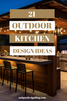 an outdoor kitchen with bar stools and lights