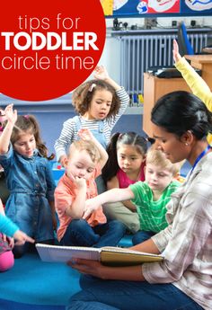 a group of children sitting on the floor in front of an adult reading a book