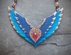 Spiritual Winged Jewelry For Gift, Wing-shaped Necklace For Valentine's Day Gift, Bohemian Winged Jewelry For Gifts, Wing-shaped Jewelry For Valentine's Day Gift, Valentine's Day Gift Jewelry Wing-shaped, Valentine's Day Wing-shaped Jewelry Gift, Blue Wing-shaped Jewelry Gift, Flying Heart, Winged Heart