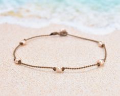 Playfully dainty, our Princess anklets are truly waterproof, unisex & perfect for any occasion. Inspired by our best-selling Princess necklaces, these are the everyday ankle bracelets that take you from the beach to the pool, and back again all summer long. (Beach and pool not necessary for carefree summer vibes!)- 5 peach pearls - oval, baroque, or rondelle, you choose! (or the details/size)- Signature hand-spun Tula Blue ROPE- 100% waterproof- Loop & puka shell closure- Standard length: 10"One Pearl Princess, Princess Necklace, Puka Shell, Versatile Jewelry, Ankle Bracelets, Long Beach, The Pool, Summer Vibes, Anklets