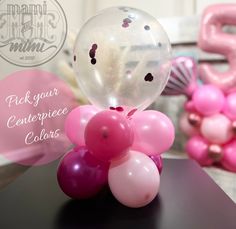 some balloons are sitting on a table