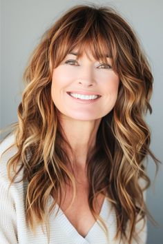 Long Layers with Full Bangs Hairstyle for Women Over 40 with Thick Hair. Straight Across Bangs, Bubble Ponytail