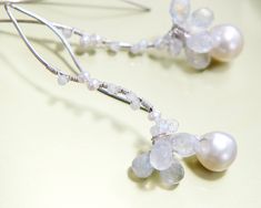 "Rainbow Moonstone, tiny fresh water pearl are wrapped and Japanese akoya baroque pearl dangles from white blossom. Wear them on a daily basis or for just about any special occasion. Akoya pearl approx 7mm in diameter, please note that they are baroque pearl, not round, may has natural tiny dents. Come from uwajima, Ehime prefecture in Japan 14k gold filled, 20gauge ( 0.8mm thick) Total length of the earrings is approx 2\" (5.2cm) Come in gift box Made to Order Please don't hesitate to ask if yo Wire Wrapped Briolette Jewelry For Wedding, Wedding Briolette Wire-wrapped Jewelry, Elegant Chandelier Earrings With Natural Stones In Sterling Silver, Elegant Sterling Silver Chandelier Earrings With Natural Stones, White Gold Briolette Earrings For Wedding, Delicate Wire Wrapped Pearl Earrings For Wedding, Silver Pearl Earrings With Natural Stones, White Natural Stone Pearl Earrings For Wedding, White Pearl Earrings With Natural Stones For Wedding