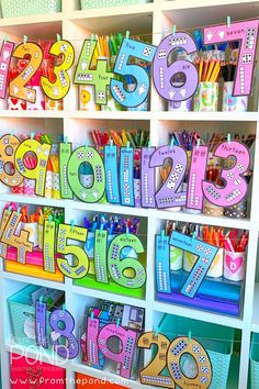 the shelves are filled with letters and numbers for school supplies to be used in their classroom