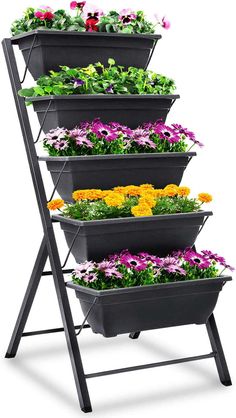 four tiered planter stand with flowers in it