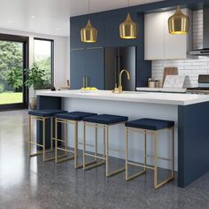 a kitchen with an island and stools in it