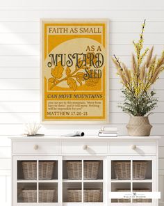 a white cabinet with baskets on top and a yellow poster above it that says, faith as small as a mustard seed can move mountains