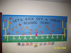 a bulletin board is hanging on the wall next to a door that says, let's kick off a great school year