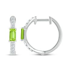 Fanciful and bright, these peridot hoop earrings pack a big sparkle. Crafted in sterling silver Each hoop showcases a baguette-cut peridot set vertically at the center Round-cut white lab-created sapphires shimmer above and below The hoops secure with hinged backs Green Sterling Silver Huggie Earrings, Green Sterling Silver Hoop Earrings For May Birthstone, Fine Jewelry Green Sterling Silver Hoop Earrings, Green Sterling Silver Small Hoop Earrings, White Lab, Baguette Cut, Sterling Earrings, Sterling Silver Earrings, Sapphire