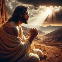 jesus sitting in the desert with his hands clasped