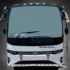 the front end of a white bus on a dark background