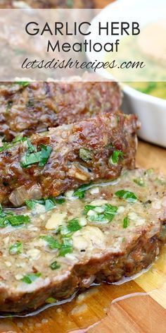 garlic herb meatloaf on a cutting board