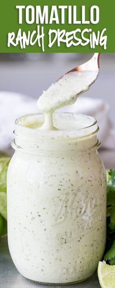 a jar filled with ranch dressing sitting on top of a table