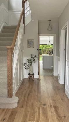 the hallway is clean and ready for us to use as an entrance way in this house