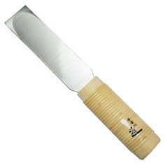 a large knife with a wooden handle on a white background