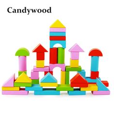 the colorful wooden blocks are stacked on top of each other, with different shapes and sizes