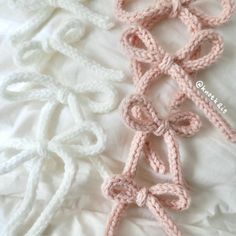 there is a crocheted knot on the bed