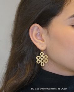 "Beautiful, stylish matte, gold plated huggie hoops with a infinity earrings. * Length: Big - 1.5\" / 4cm. Small - 0.6\" / 1.5cm. * For pierced ears ------------------- Infinity earrings are a must have fashion accessory for the jewelry enthusiast. Lovely, elegant and spiritually charged, these gold modern earrings will make a statement with your fashion. The infinity design will meaningfully guide you each day, making these huggie hoops earrings a wonderful everyday piece. Dress up, dress down, Hoop Earrings With Charm, Unique Hoop Earrings, Modernist Earrings, Geode Jewelry, Infinity Earrings, Minimalist Earrings Gold, Blue Crystal Earrings, Infinity Design, Gold Earrings For Women