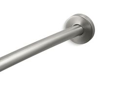 a close up of a metal handle on a white wall