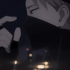 an anime character pointing at something in the dark