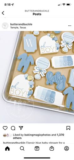 an image of baby shower cookies with blue icing