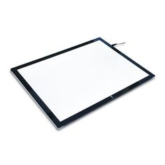 a black and white photo frame sitting on top of a table next to a pen