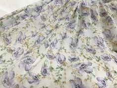 Floral print viscose chiffon fabric. Fashionable, extremely lightweight, sheer fabric perfect for all types of wearing apparel (especially kimonos), often used with lining fabric Listing is for ONE YARD. ( 1 yards = 0.91M ) Fabric width approx: 53.1 Inches (135 cm) ..♥ ¸¸..♥ ¸¸..♥ ..♥ ¸¸..♥ ¸¸..♥.. Wholesale acceptable! MORE FABRICS https://www.etsy.com/shop/lacelindsay?ref=hdr_shop_menu&section_id=14156869 Feel free to contact me with any questions. To view all our items please click here: Spring Chiffon Dress With Sheer Dupatta, Elegant Spring Embroidered Dupatta Fabric, Elegant Spring Dupatta Embroidered Fabric, Lace Mask, Eyelet Embroidery, Lavender Floral, Lace Garter, Embroidery Lace, Flower Applique