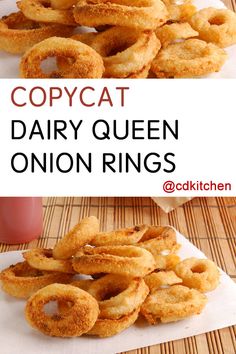 onion rings are stacked on top of each other with the words copycat dairy queen onion rings