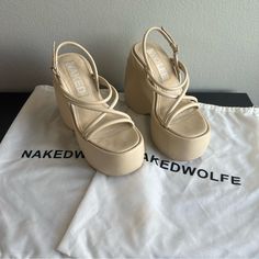 Naked Wolfe Mystery In Oat Size Eu 37 Us 7. Very Good Condition! True To Size, Could Also Fit 7.5 Id Say. Used Once Before Me, And I Wore Once To A Wedding. Slight Indents And Scuffs On Sides Of Shoe, Captured As Best I Could In Pics. Both Original Dust Bags Included, Coffee Stain On One Shown In Last Photo. Original Box Is No Longer Included. Price Reflects Imperfections, No Longer Sold On Website. Rare To Find In This Size And Condition, Grab While You Can! Sad To Let These Go But I Hope Someone Will Use Them More Than Me! #Futuristic #Cyber Naked Wolfe, Coffee Stain, Coffee Staining, Women's Pumps, Oats, Shoes Women Heels, A Wedding, Original Box, Dust Bag