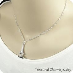 This Eiffel Tower Charm necklace comes on a silver-plated chain that is available in different lengths. Please choose your desired length from the drop-down menu when placing the item in your shopping cart. { CHARM DETAILS }★ Material: Pewter ★ Finish Color: Silver★ Measurements: 1/2" x 1"★ Dimensions: 3-Dimensional★ Made in the USA{ SIMILAR ITEMS } More travel and landmark items available from my shop: https://www.etsy.com/shop/treasuredcharms/search?search_query=landmark{ GIFT OPTIONS}Gift box Silver Teardrop Pendant Charm Necklace, Silver Adjustable Teardrop Pendant Charm Necklace, Silver Teardrop Pendant Charm Necklace Nickel Free, Silver Nickel-free Teardrop Pendant Charm Necklace, Silver Teardrop Pendant Charm Necklace As Gift, Paris Necklace, Eiffel Tower Necklace, Paris Themed, Paris Theme