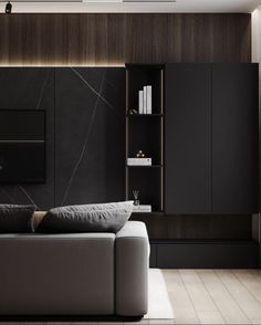 a modern living room with black and white decor